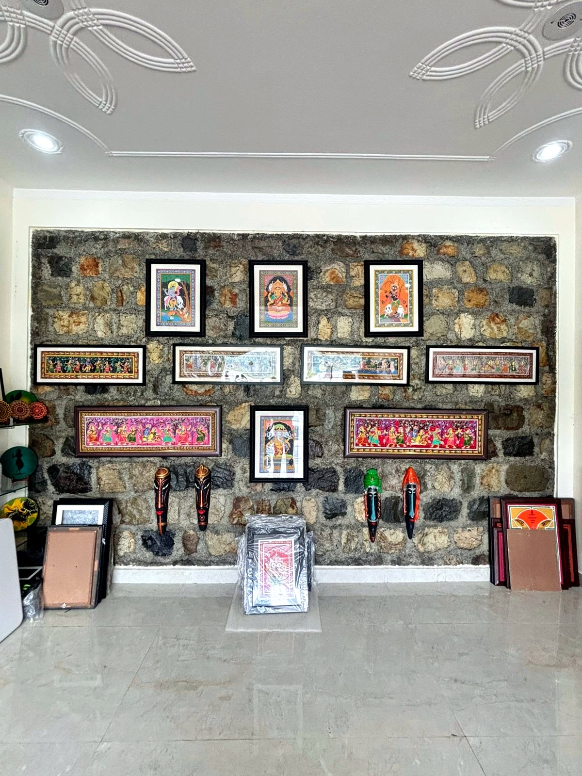 कलाnidhi gallery wall with framed artworks